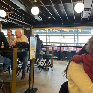 a group of people sitting at a table