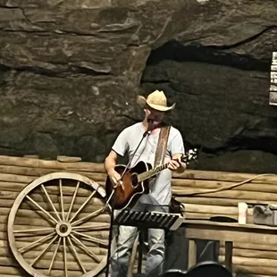 a man playing a guitar