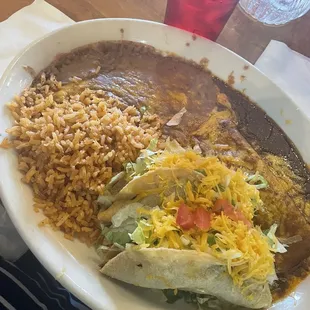 23. 1 Cheese Enchilada, 2 Beef Tacos, Rice and Beans