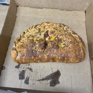 a slice of pizza in a box