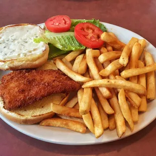 Fish burger with fries.