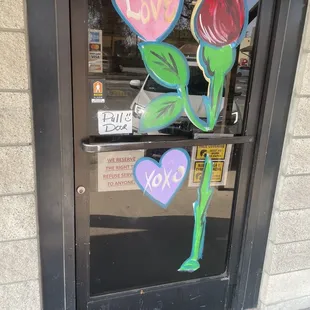 a painted rose on a door