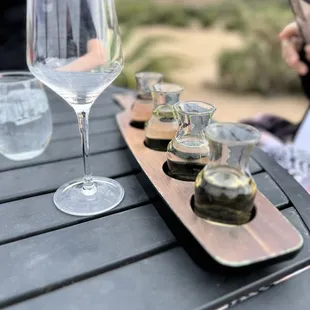 a tray of wine glasses on a table