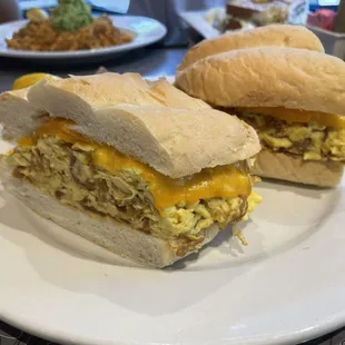#SPECIAL BREAKFAST SANDWICHE #
 Eggs Scrambled  # Smoked pork belly#roasted garlic#Swiss cheese