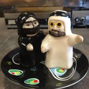 two salt and pepper shakers