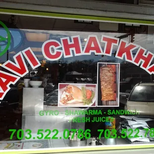 a sign in the window of a restaurant