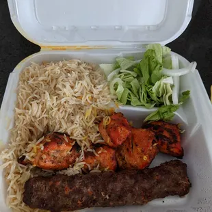 a meal in a styrofoam container