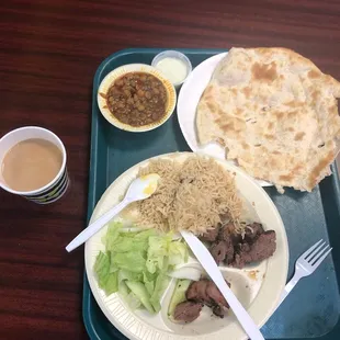 Paid $17 waited 30 min and endured bad service and ugly ambiance for cold rice lettuce and a chutney I didn&apos;t order or like! Meat was ok.