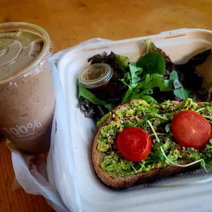 Almond smoothie with added cacao. My go-to everytime I'm in the area. Avocado toast, first time having it. Wasn't bad.