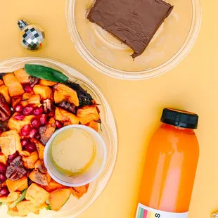 Sweet potato salad, dark chocolate cream tart, and carrotene dream fresh cold pressed juice