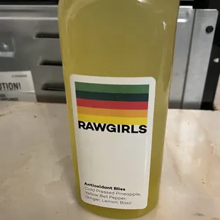 a bottle of raw girls lemonade