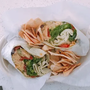 a plate of food with tortillas