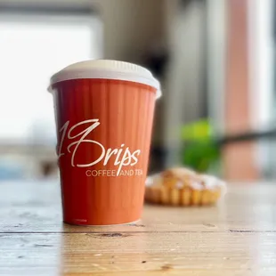 a cup of coffee on a table