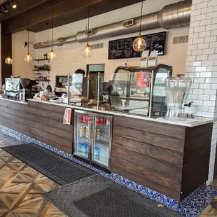 a coffee shop counter with a counter top