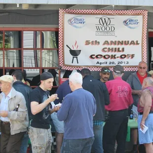 a large group of people standing in line