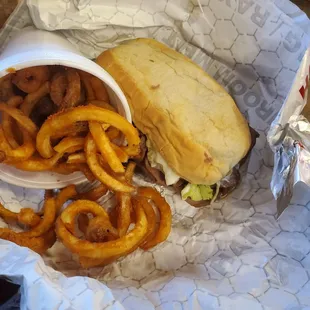 a sandwich and onion rings