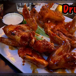 a plate of chicken wings