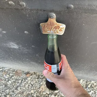 Coke with old fashion opener.