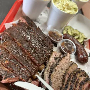 Half Rack Pork Spare Ribs, Pound of Brisket, Single Jalapeño Cheddar Sausage, Baked Beans, &amp; Potato salad