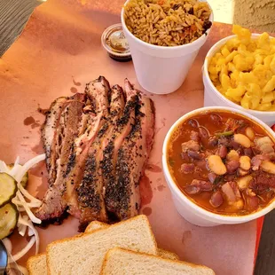 1 pound of brisket. Side of beans, Mac and cheese and rice. So delicious!