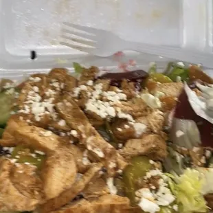 a chicken salad in a styrofoam container