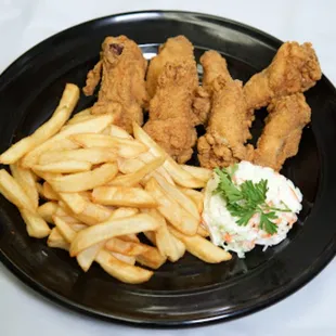 a plate of fries and coleslaw
