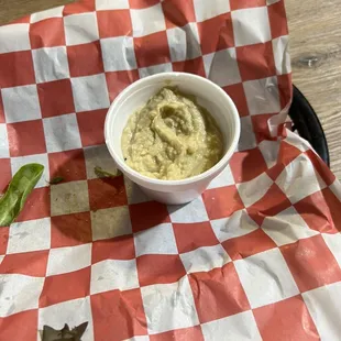 Baba ganoesh. Send the 1st batch back because it was greyish, sour, and looked expired. Was replaced with this new one.