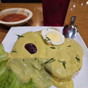 Ocopa Arequipena: boiled potatoes w sauce of peanuts and peppers (cold), not spicy.