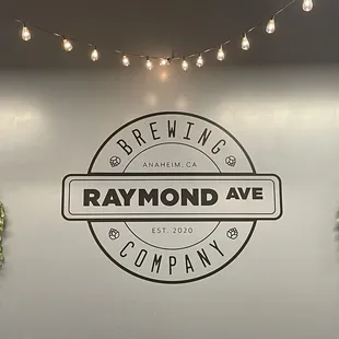 the logo and hanging plants