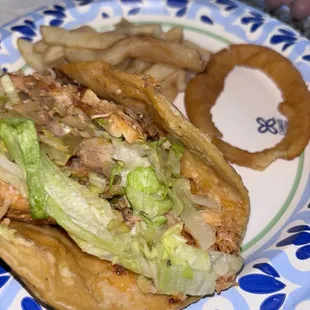 Chicken Taco, onion rings &amp; fries