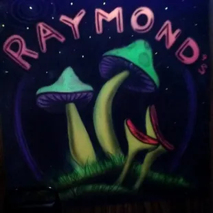 a neon sign with mushrooms