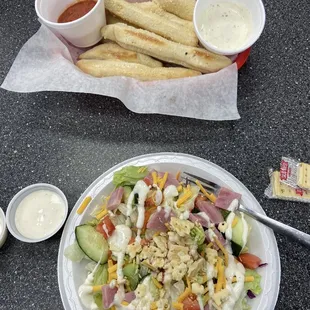 Salad and breadsticks