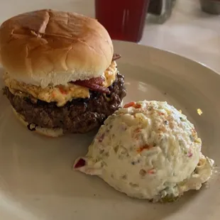 a hamburger and coleslaw
