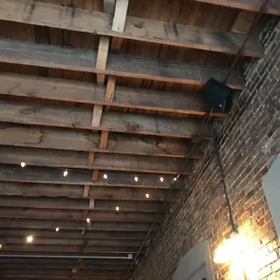 a ceiling with exposed beams
