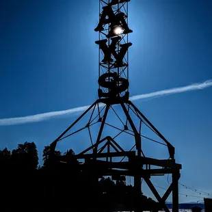 the silhouette of a boathouse