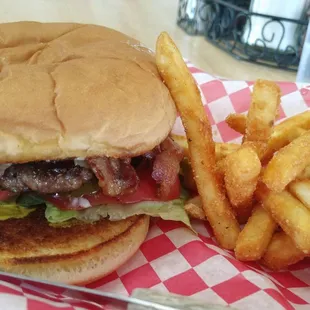 Pretty good bacon cheeseburger, like decent backyard flavor, 3/5. Fries better, nice &amp; crispy.