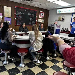 people sitting at the counter