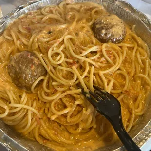 Spaghetti with meat balls with rose sauce