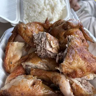 a plate of rice and chicken