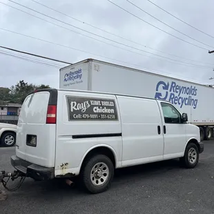 a delivery truck parked in a parking lot