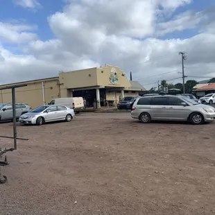 Located in the open lot next to Malama Market