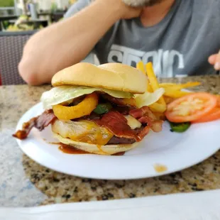 western burger with bacon, cheese, jalapenos, onion rings and BBQ sauce.