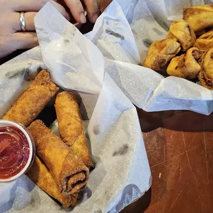 Pizza egg rolls, Buffalo chicken crab rangoons