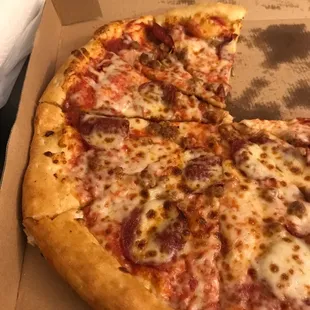 Hardly any pepperoni -one piece per slice of pizza - and skimpy with the sausage.