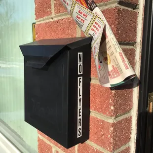 I guess your handbill people can't read. It's really great how they stuff it behind my mailbox, pulling away from the brick.