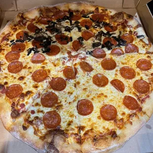 Extra large pepperoni and half mushroom