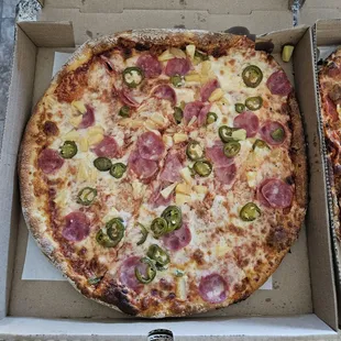 We highly recommend Rays Pizza on 59th Ave and Greenway. The Hawaiian with jalapeños was amazing