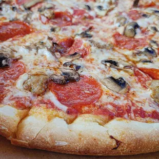 a pepperoni and mushroom pizza