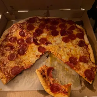 a pepperoni pizza in a box