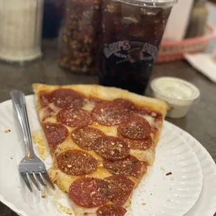 a slice of pepperoni pizza